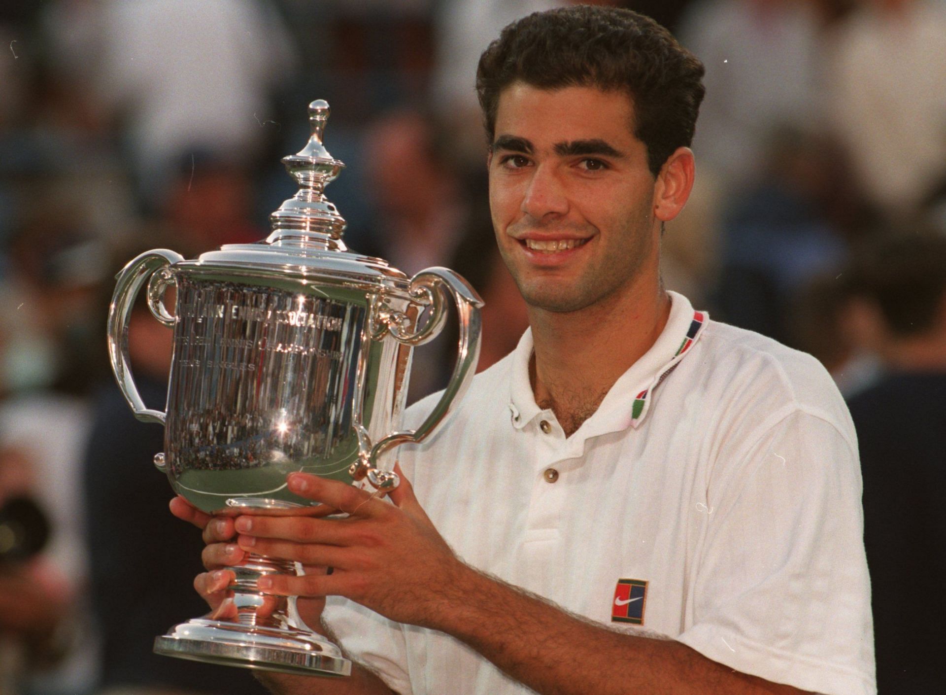 Pete Sampras poses with the 1995 US Open title | Image Source: Getty